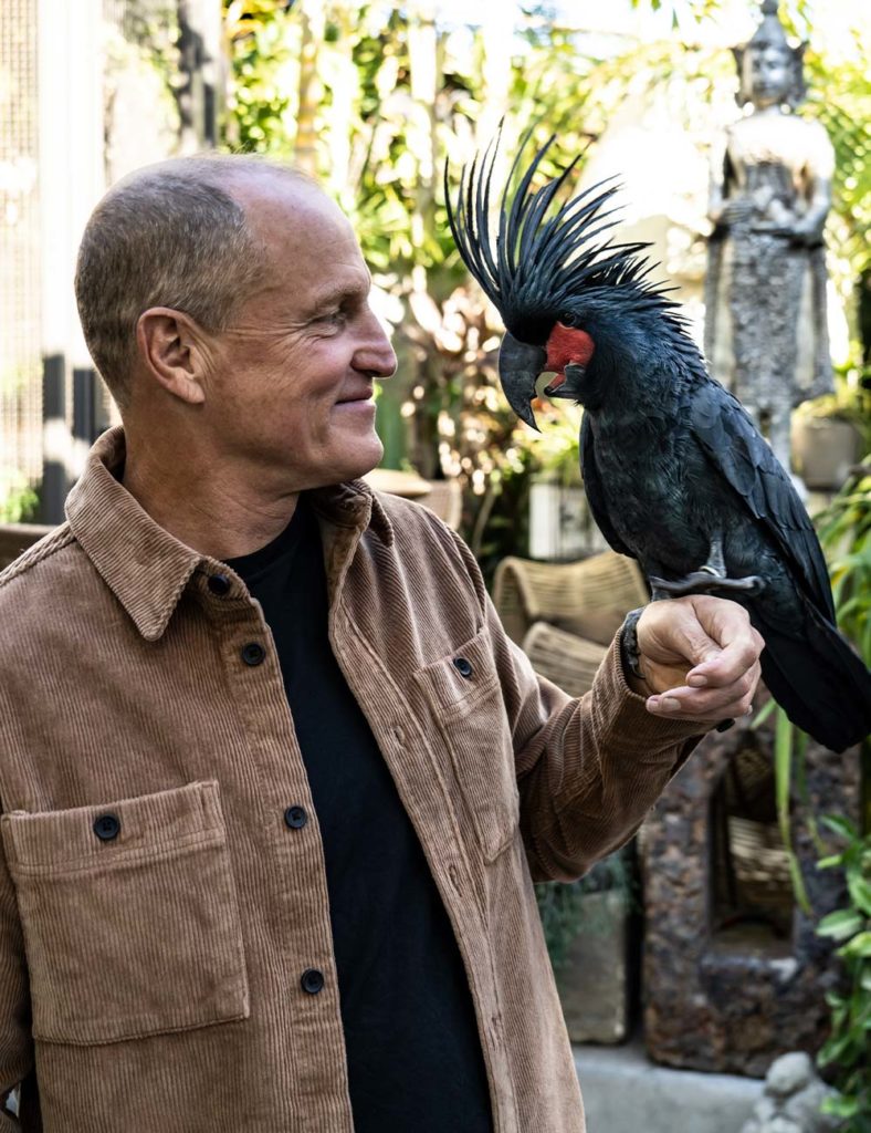 Woody Harrelson with a bird.