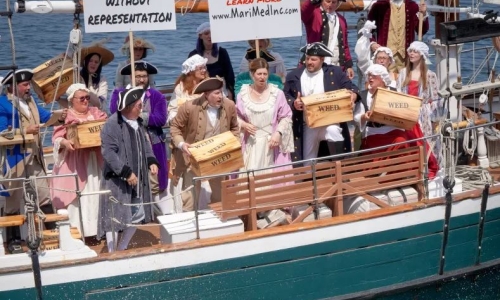 Executives re-enact Boston Tea Party to protest Cannabis tax rule