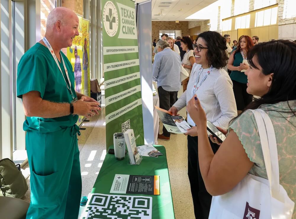 Texas Cannabis Clinic booth at the 2024 Texas Cannabis Policy Conference
